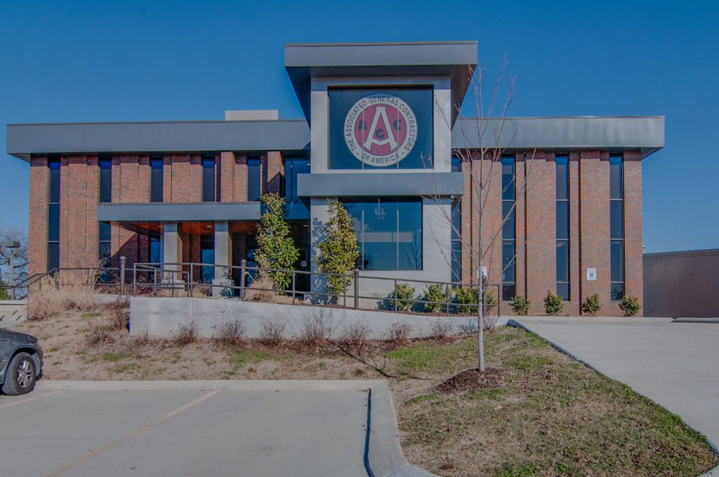 The Associated General Contractors building with a blue sky in the background.
