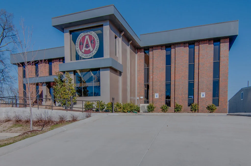 Commercial building architectural design in Nashville with brick exterior and modern glass windows